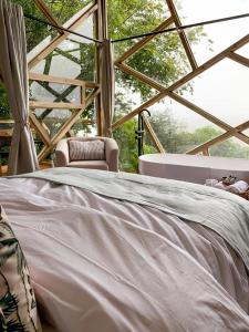 Llit o llits en una habitació de Quaint Luxury Villas