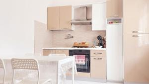 Kuchyň nebo kuchyňský kout v ubytování Lovehome