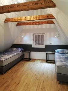 Postel nebo postele na pokoji v ubytování Haus mit Garten Familie Pabst