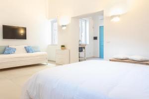 Postel nebo postele na pokoji v ubytování Sicily Sunset Apartment