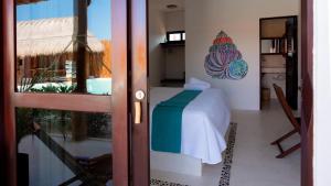 Postel nebo postele na pokoji v ubytování Mis Sueños Holbox