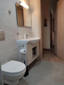 Koupelna v ubytování Cosy apartment in Stoupa