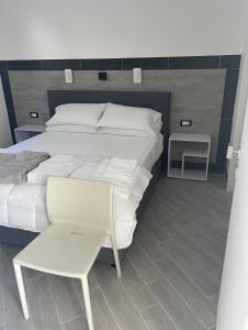 Postel nebo postele na pokoji v ubytování LA CASA DELLE FATE-Area Marina Protetta