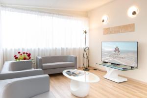 TV a/nebo společenská místnost v ubytování Hotel Atlantico