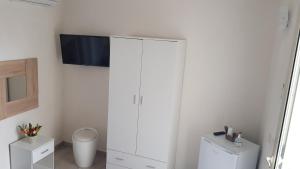 TV a/nebo společenská místnost v ubytování B & B Da Rosa