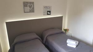 Postel nebo postele na pokoji v ubytování B & B Da Rosa