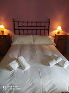 Postel nebo postele na pokoji v ubytování Masia MATUTANO
