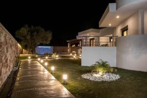 Vonkajšia záhrada v ubytovaní Le Ialyse Luxury Villa