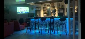TV a/nebo společenská místnost v ubytování Hotel Casa Modelia