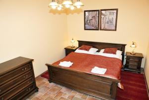 Voodi või voodid majutusasutuse Hotel Pelikán toas