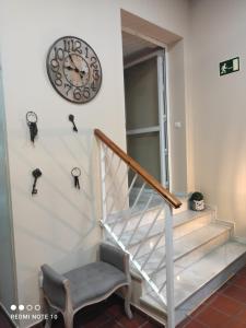 Postel nebo postele na pokoji v ubytování Hostal Puerta Carmona