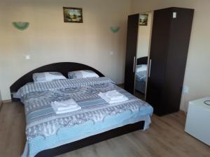 Ліжко або ліжка в номері Guest Rooms Mihaylovi