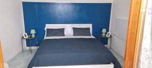 A bed or beds in a room at "CASA SUNSET"