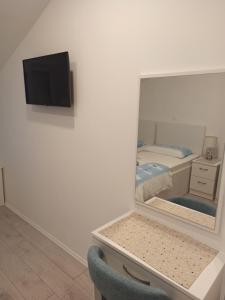 Postel nebo postele na pokoji v ubytování Peric Apartment West Dubrovnik