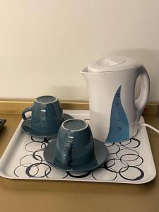 Kaffemaskin og/eller vannkoker på Oasi Park Hotel