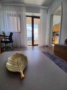 a living room with a shell on the floor at BELVEDERE Apartments in Bucharest