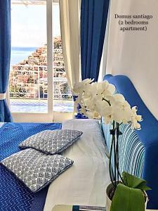 Postel nebo postele na pokoji v ubytování Santiago vacation home in Positano
