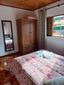 Posteľ alebo postele v izbe v ubytovaní Casa Recanto
