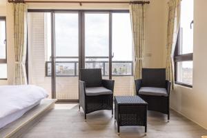 Ένα ή περισσότερα κρεβάτια σε δωμάτιο στο Fu Lai Residence