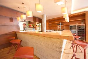 Kuchyň nebo kuchyňský kout v ubytování Hotel Manggei Designhotel Obertauern