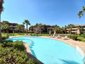 Swimmingpoolen hos eller tæt på Prestigia Appartement de luxe