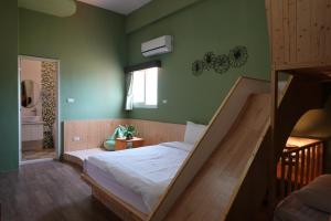 Postel nebo postele na pokoji v ubytování Provence Homestay