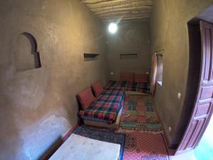 Katil atau katil-katil dalam bilik di Authentic riad & activities Erg