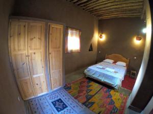 Katil atau katil-katil dalam bilik di Authentic riad & activities Erg