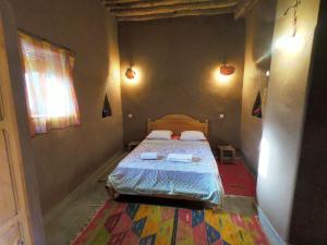 Katil atau katil-katil dalam bilik di Authentic riad & activities Erg