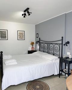 Postel nebo postele na pokoji v ubytování Villa Volli Three Rooms