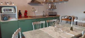 A kitchen or kitchenette at LA CA' 'D PINET