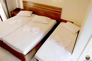 Postel nebo postele na pokoji v ubytování Hotel Sias Resort