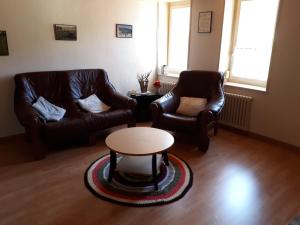 A seating area at Halte au pied du Creux du Van