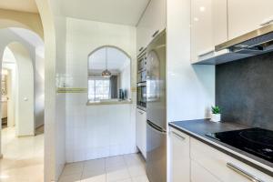 A kitchen or kitchenette at Hanami Puerto Alto PA 1-5