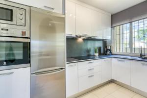 A kitchen or kitchenette at Hanami Puerto Alto PA 1-5