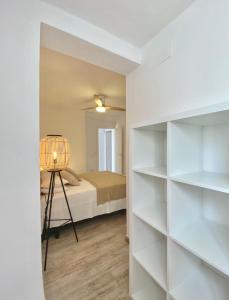 A bed or beds in a room at La Calma Sea Loft - Apartamento Boutique con Vistas