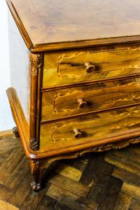 a wooden dresser sitting on top of a wooden floor at Roth´s Apartment in Košice