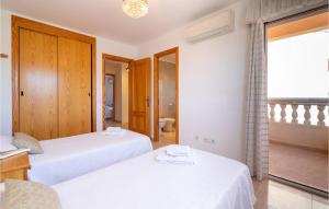 Posteľ alebo postele v izbe v ubytovaní Gorgeous Home In Port Dalcúdia