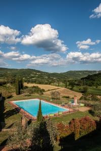 Bazén v ubytovaní Il Colombaio Agriturismo alebo v jeho blízkosti