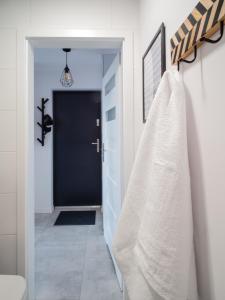 Koupelna v ubytování Coco Apartments Kołobrzeska 42 + 23 fotografií