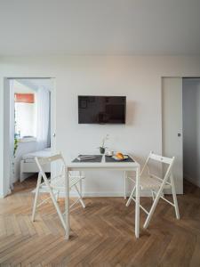 TV a/nebo společenská místnost v ubytování Coco Apartments Kołobrzeska 42