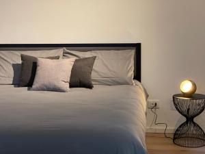 Posteľ alebo postele v izbe v ubytovaní CASA ENEA TERRACINA - Relax Sauna Apartment