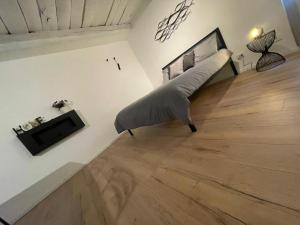 Posteľ alebo postele v izbe v ubytovaní CASA ENEA TERRACINA - Relax Sauna Apartment