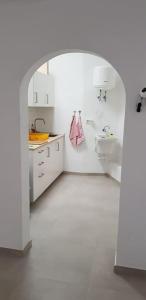 a white kitchen with a sink and a sink at Azul in Puerto del Carmen