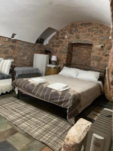 Ένα ή περισσότερα κρεβάτια σε δωμάτιο στο Aroma Avlis Apartment