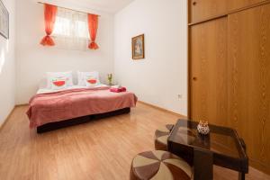 Posteľ alebo postele v izbe v ubytovaní Apartment Kaja