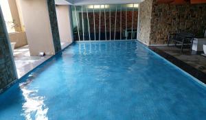 Bazén v ubytování The Viana Apartment 1 nebo v jeho okolí