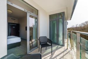 Balkon lub taras w obiekcie Apartament z aneksem kuchennym i basenem 426 Diune Hotel Resort