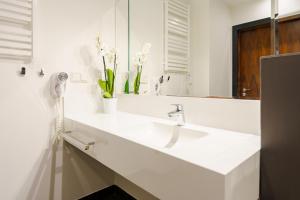 Łazienka w obiekcie Apartament z aneksem kuchennym i basenem 426 Diune Hotel Resort