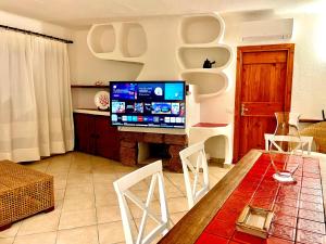 A television and/or entertainment centre at La Casa Smeralda